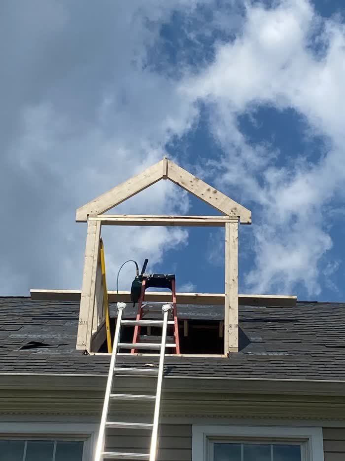 Dormer frame on a shingle roof