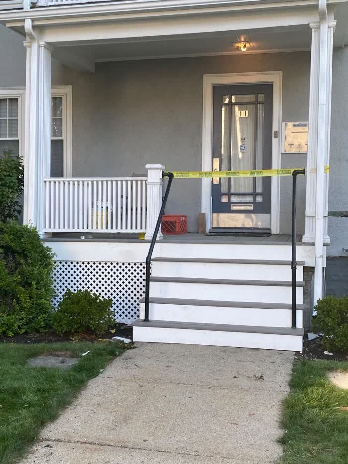 Front porch with railing and steps