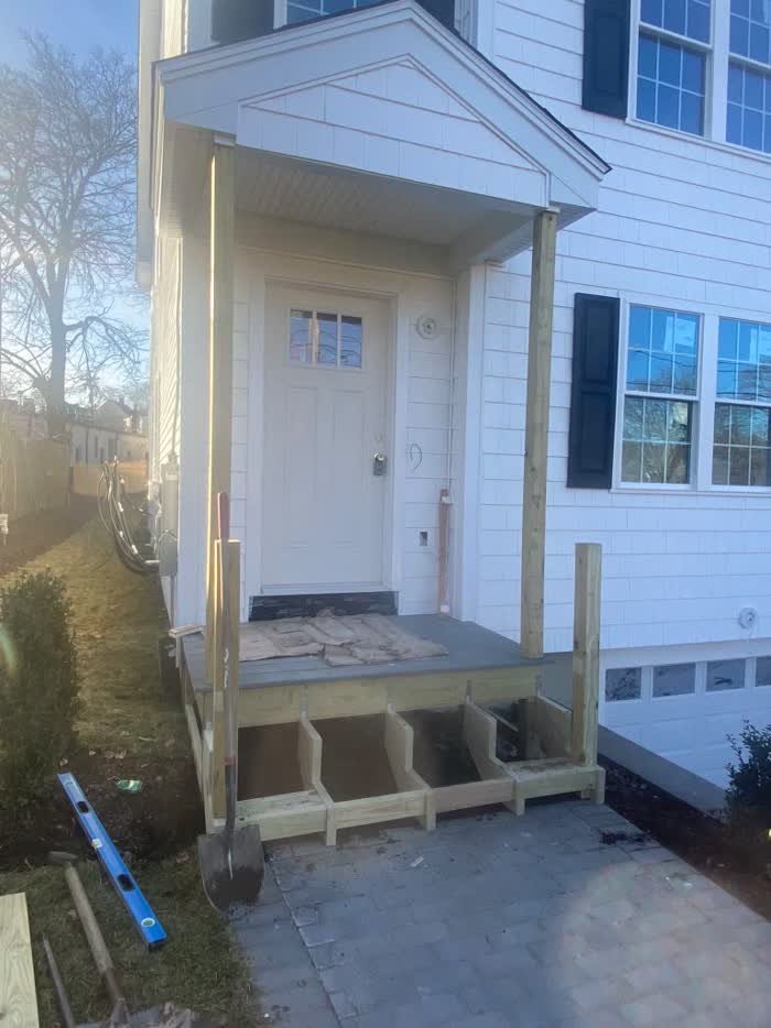 Entry portico with white columns